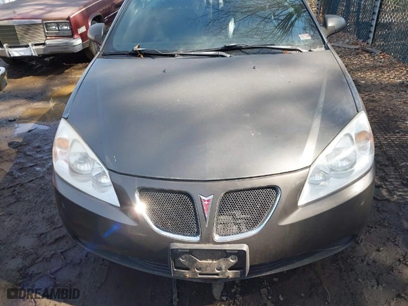 2007 Pontiac G6 GT with VIN 1G2ZH35N174190369, listed as a IAAI auction lot 41660611 with NaN miles. Bid and sale history available at carsss.com. Image 6.