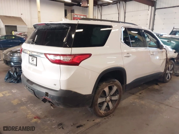 2019 Chevrolet Traverse LT Leather with VIN 1GNEVHKWXKJ147566, listed as a IAAI auction lot 40885257 with 116,690 mi miles. Bid and sale history available at carsss.com. Image 4.
