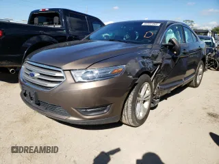 2016 Ford Taurus SEL with VIN 1FAHP2H83GG132648, listed as a Copart auction lot 36502393 with 114,283 mi miles and Salvage title. Bid and sale history available at DreamBid. Image 1.
