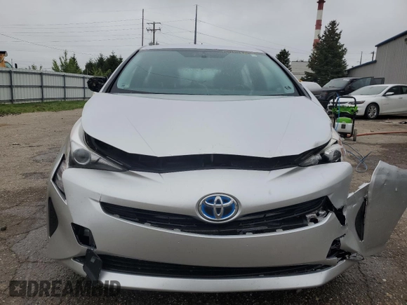 2016 Toyota Prius Two z VIN JTDKBRFU8G3006171, wystawiony jako Copart lot #57156035 z przebiegiem 228 265 mil mil oraz Czysty tytuł • Clean title. Historia ofert i sprzedaży dostępna na DreamBid. Obrazek 5.