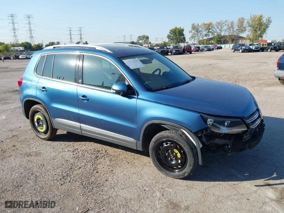 2017 Volkswagen Tiguan Wolfsburg Edition with VIN WVGRV7AX0HW502041, listed as a IAAI auction lot 31232130 with 30,214 mi miles. Bid and sale history available at carsss.com. Image 1.