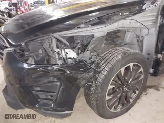 2016 Mazda CX-5 Grand Touring with VIN JM3KE2DY9G0635368, listed as a IAAI auction lot 41699616 with 240,619 mi miles. Bid and sale history available at carsss.com. Image 18.