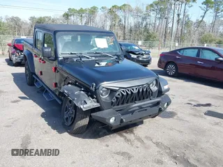 2022 Jeep Gladiator Texas Trail z VIN 1C6HJTAGXNL101704, wystawiony jako IAAI lot #41590378 z przebiegiem 29 299 mil mil oraz . Historia ofert i sprzedaży dostępna na DreamBid. Obrazek 1.
