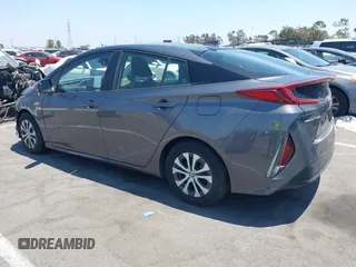 2021 Toyota Prius LE with VIN JTDKAMFPXM3170372, listed as a IAAI auction lot 42661609 with 47,977 mi miles and . Bid and sale history available at DreamBid. Image 3.