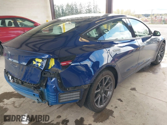 2022 Tesla Model 3 Long Range with VIN 5YJ3E1EB3NF267365, listed as a IAAI auction lot 41996594 with 32,687 mi miles and . Bid and sale history available at DreamBid. Image 4.