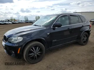 2012 BMW X5 35i z VIN 5UXZV4C51CL767106, wystawiony jako Copart lot #57334855 z przebiegiem 169 529 mil mil oraz Czysty tytuł • Clean title. Historia ofert i sprzedaży dostępna na DreamBid. Obrazek 1.