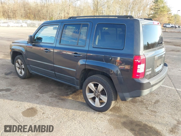 2014 Jeep Patriot Latitude with VIN 1C4NJRFB4ED720241, listed as a IAAI auction lot 40914199 with 128,218 mi miles. Bid and sale history available at carsss.com. Image 3.