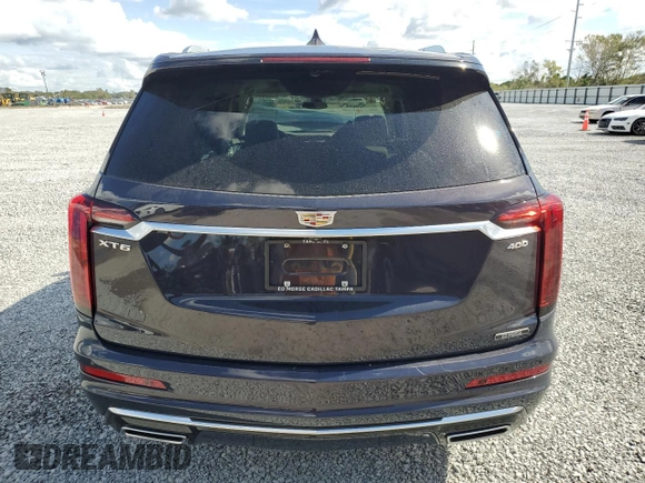 2024 Cadillac XT6 FWD Premium Luxury with VIN 1GYKPCRS5RZ732850, listed as a Copart auction lot 89112655 with 3,518 mi miles and Salvage Title. Bid and sale history available at carsss.com. Image 6.