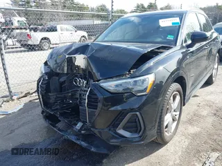 2020 Audi Q3 S line Premium z VIN WA1DECF31L1030946, wystawiony jako IAAI lot #41774297 z przebiegiem 58 548 mil mil oraz . Historia ofert i sprzedaży dostępna na DreamBid. Obrazek 6.
