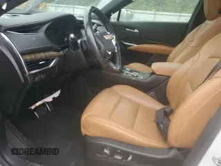 2019 Cadillac XT4 FWD Sport z VIN 1GYFZER49KF199885, wystawiony jako Copart lot #56836895 z przebiegiem 58 486 mil mil oraz Szkoda całkowita • Salvage title. Historia ofert i sprzedaży dostępna na DreamBid. Obrazek 7.