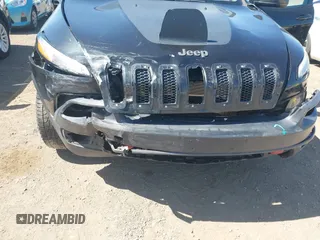 2016 Jeep Cherokee Trailhawk with VIN 1C4PJMBB9GW179051, listed as a IAAI auction lot 42520342 with 100,538 mi miles and . Bid and sale history available at DreamBid. Image 6.