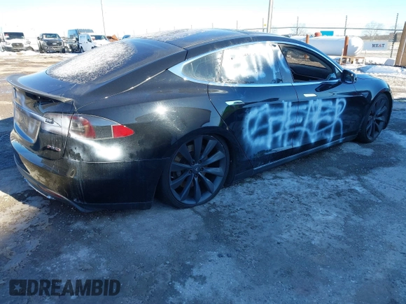 2013 Tesla Model S with VIN 5YJSA1CNODFP07903, listed as a IAAI auction lot 41281788 with Not Provided miles. Bid and sale history available at carsss.com. Image 4.