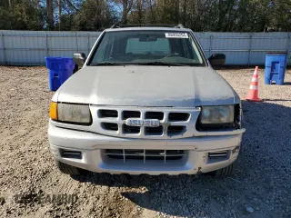 1999 Isuzu Rodeo S with VIN 4S2CK58W7X4357910, listed as a Copart auction lot 86955254 with 105,593 mi miles and Salvage Title. Bid and sale history available at DreamBid. Image 5.