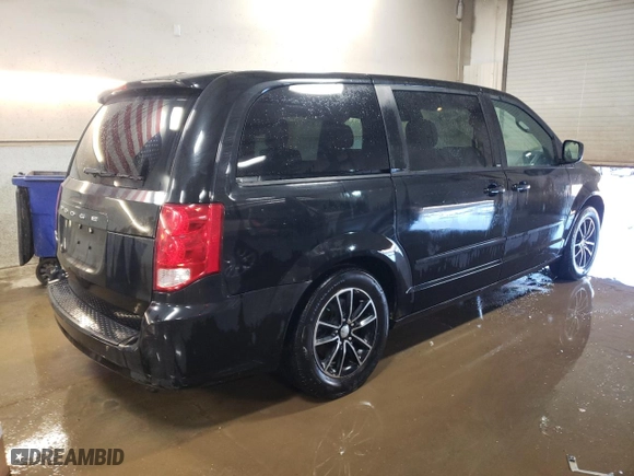 2014 Dodge Grand Caravan SXT with VIN 2C4RDGCG4ER104887, listed as a Copart auction lot 48569215 with 126,910 mi miles and Salvage Title. Bid and sale history available at carsss.com. Image 3.