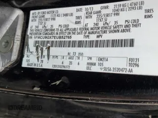 2014 Ford Escape SE with VIN 1FMCU9GX7EUB52765, listed as a Copart auction lot 57563305 with 187,203 mi miles and Salvage title. Bid and sale history available at DreamBid. Image 13.