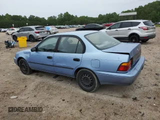 1995 Toyota Corolla DX with VIN 2T1AE09B5SC127586, listed as a Copart auction lot 57075045 with 244,969 mi miles and Salvage title. Bid and sale history available at DreamBid. Image 2.