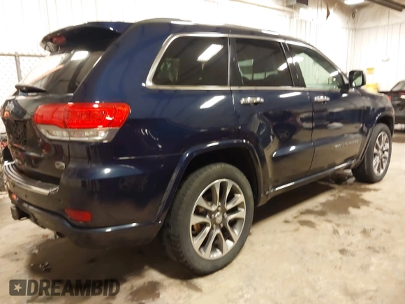 2017 Jeep Grand Cherokee Overland with VIN 1C4RJFCG3HC693897, listed as a IAAI auction lot 41636323 with 105,575 mi miles. Bid and sale history available at carsss.com. Image 4.