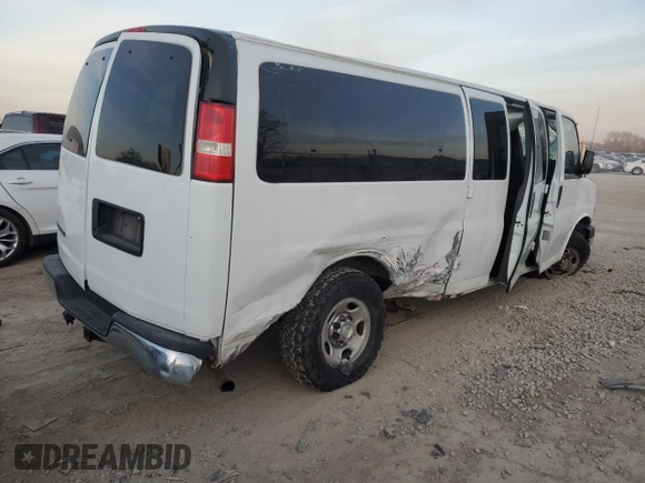 2014 Chevrolet Express Passenger LT with VIN 1GAZG1FGXE1187397, listed as a Copart auction lot 43209785 with 168,614 mi miles and Salvage title. Bid and sale history available at DreamBid. Image 3.