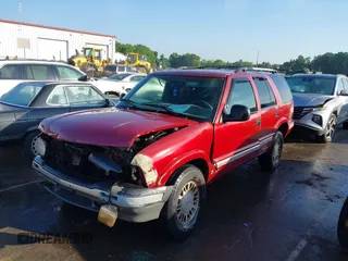 1995 GMC Jimmy SLE z VIN 1GKDT13W1SK528155, wystawiony jako IAAI lot #42177589 z przebiegiem 283 900 mil mil oraz . Historia ofert i sprzedaży dostępna na DreamBid. Obrazek 2.