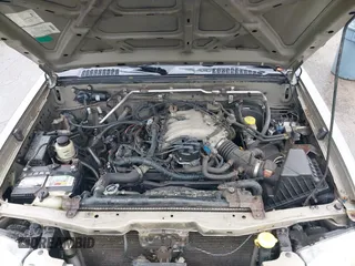 2004 Nissan Frontier XE Desert Runner z VIN 1N6ED26Y84C449544, wystawiony jako IAAI lot #42359120 z przebiegiem 157 483 mil mil oraz . Historia ofert i sprzedaży dostępna na DreamBid. Obrazek 10.