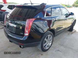 2012 Cadillac SRX Premium Collection z VIN 3GYFNCE36CS615725, wystawiony jako IAAI lot #42738584 z przebiegiem 156 625 mil mil oraz . Historia ofert i sprzedaży dostępna na DreamBid. Obrazek 4.