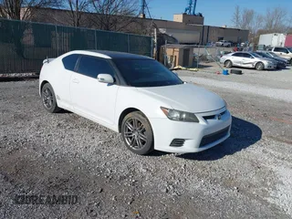 2011 Scion tC z VIN JTKJF5C73B3014543, wystawiony jako IAAI lot #41699329 z przebiegiem 190 971 mil mil oraz . Historia ofert i sprzedaży dostępna na DreamBid. Obrazek 1.