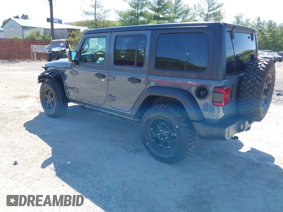 2024 Jeep Wrangler Sport S with VIN 1C4PJXDN2RW351741, listed as a IAAI auction lot 42122651 with 4,241 mi miles and . Bid and sale history available at DreamBid. Image 3.