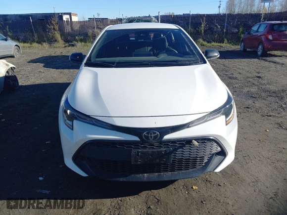 2021 Toyota Corolla Hatchback SE with VIN JTND4MBE7M3141993, listed as a Copart auction lot 73617514 with 20,029 mi miles and Salvage Title. Bid and sale history available at carsss.com. Image 5.