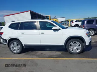 2019 Volkswagen Atlas SE z VIN 1V2WR2CA3KC503490, wystawiony jako IAAI lot #42168340 z przebiegiem 70 868 mil mil oraz . Historia ofert i sprzedaży dostępna na DreamBid. Obrazek 14.