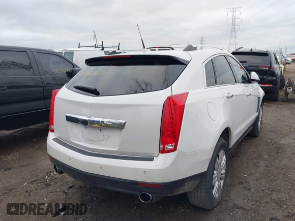 2013 Cadillac SRX Luxury Collection with VIN 3GYFNCE32DS527577, listed as a IAAI auction lot 41916467 with 137,462 mi miles and . Bid and sale history available at DreamBid. Image 4.