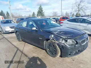 2014 BMW 5 Series 535i xDrive with VIN WBA5B3C52ED534784, listed as a IAAI auction lot 41875567 with 128,533 mi miles and . Bid and sale history available at carsss.com. Image 1.