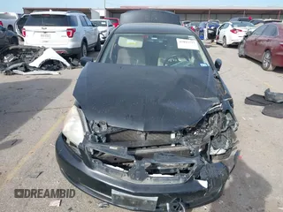 2006 Mitsubishi Lancer ES with VIN JA3AJ26EX6U059654, listed as a IAAI auction lot 41817577 with 180,177 mi miles. Bid and sale history available at carsss.com. Image 12.