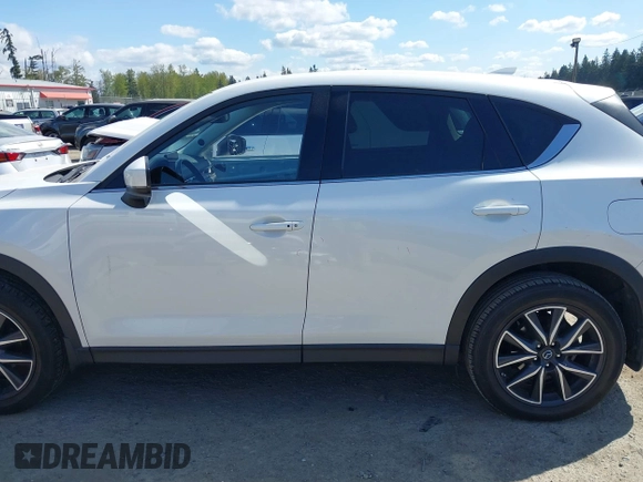2017 Mazda CX-5 Grand Touring with VIN JM3KFBDL9H0163031, listed as a IAAI auction lot 42098819 with 81,781 mi miles. Bid and sale history available at carsss.com. Image 15.
