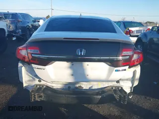 2018 Honda Clarity z VIN JHMZC5F11JC013866, wystawiony jako IAAI lot #38266703 z przebiegiem 97 522 mil mil oraz . Historia ofert i sprzedaży dostępna na DreamBid. Obrazek 17.