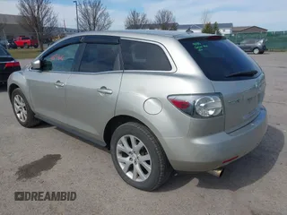 2009 Mazda CX-7 Grand Touring with VIN JM3ER29L890235402, listed as a IAAI auction lot 41834012 with 117,179 mi miles. Bid and sale history available at carsss.com. Image 3.