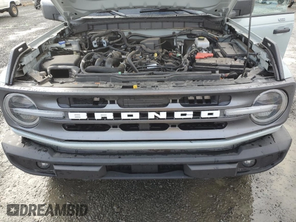 2023 Ford Bronco with VIN 1FMDE5BH3PLA89022, listed as a Copart auction lot 78643144 with 33,095 mi miles and Salvage Title. Bid and sale history available at DreamBid. Image 13.