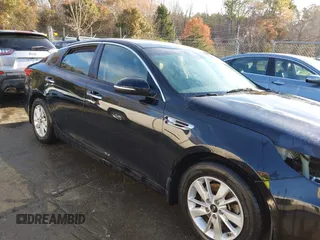 2016 Kia Optima LX z VIN 5XXGT4L30GG076989, wystawiony jako IAAI lot #41835878 z przebiegiem 150 567 mil mil oraz . Historia ofert i sprzedaży dostępna na DreamBid. Obrazek 13.