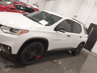 2018 Chevrolet Traverse Premier z VIN 1GNEVJKW4JJ163087, wystawiony jako IAAI lot #41509692 z przebiegiem 118 158 mil mil oraz . Historia ofert i sprzedaży dostępna na DreamBid. Obrazek 14.