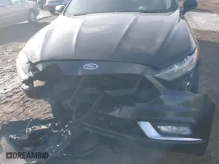 2018 Ford Fusion Hybrid SE with VIN 3FA6P0LUXJR131707, listed as a IAAI auction lot 41490634 with 129,500 mi miles. Bid and sale history available at carsss.com. Image 6.