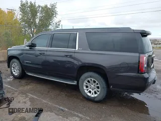 2015 GMC Yukon XL SLT with VIN 1GKS1HKC8FR219289, listed as a IAAI auction lot 40772496 with 163,477 mi miles. Bid and sale history available at carsss.com. Image 14.
