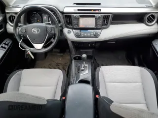 2018 Toyota RAV4 XLE with VIN JTMRFREV2JJ200677, listed as a Copart auction lot 59660535 with 82,283 mi miles and Salvage title. Bid and sale history available at DreamBid. Image 8.