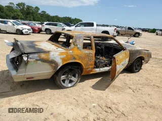 1985 Chevrolet Monte Carlo Sport SS с VIN 1G1GZ37GXFR115095, выставлен на аукционе Copart как лот 62680814 с пробегом Не указан миль и На запчасти • Non repairable. История ставок и продаж доступна на DreamBid. Изображение 3.