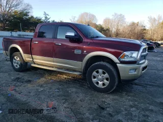 2016 Ram 2500 Laramie Longhorn with VIN 3C6UR5GL0GG323692, listed as a Copart auction lot 42044685 with 113,473 mi miles and Salvage title. Bid and sale history available at DreamBid. Image 4.