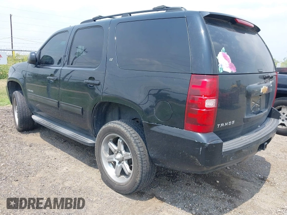 2014 Chevrolet Tahoe LT with VIN 1GNSCBE08ER193058, listed as a IAAI auction lot 42382232 with 228,749 mi miles and . Bid and sale history available at DreamBid. Image 3.