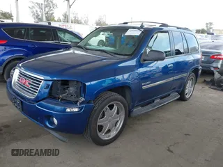 2006 GMC Envoy SLE with VIN 1GKDS13S562252049, listed as a IAAI auction lot 41940052 with 149,445 mi miles. Bid and sale history available at carsss.com. Image 18.