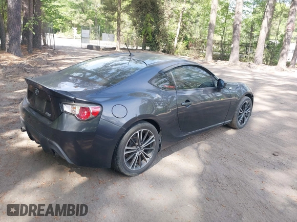 2013 Scion FR-S with VIN JF1ZNAA12D1718693, listed as a IAAI auction lot 42077260 with 110,164 mi miles. Bid and sale history available at carsss.com. Image 4.