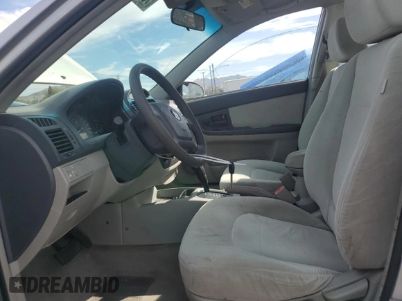 2006 Kia Spectra EX with VIN KNAFE122765228554, listed as a Copart auction lot 78458004 with 154,085 mi miles and Clean Title. Bid and sale history available at carsss.com. Image 7.