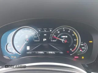 2019 BMW M5 Competition z VIN WBSJF0C52KB447102, wystawiony jako IAAI lot #41778593 z przebiegiem 31 030 mil mil oraz . Historia ofert i sprzedaży dostępna na DreamBid. Obrazek 7.