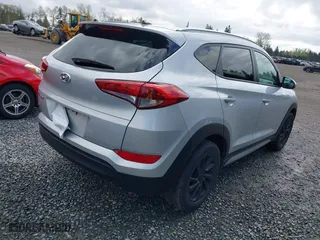 2017 Hyundai Tucson SE Plus with VIN KM8J33A40HU449337, listed as a IAAI auction lot 42010707 with 55,383 mi miles. Bid and sale history available at carsss.com. Image 4.