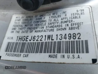 1998 Honda Civic DX with VIN 1HGEJ6221WL134982, listed as a IAAI auction lot 41904339 with 245,496 mi miles. Bid and sale history available at carsss.com. Image 9.